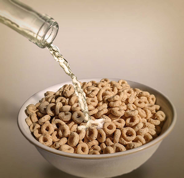 pouring wine over cereal
